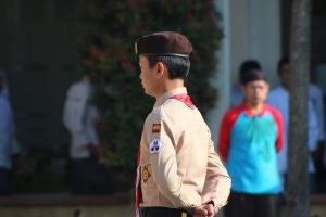 a student practicing leadership skill on a scout activity